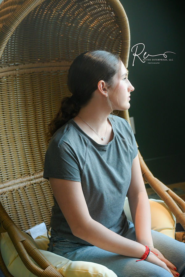 Portrait on woven chair